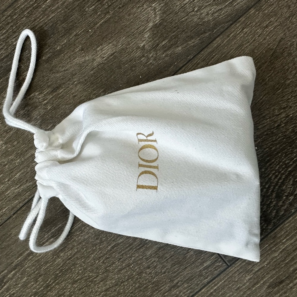 Dior White and Gold Drawstring Cosmetic Bag with Goodies